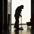 Man mopping factory floor