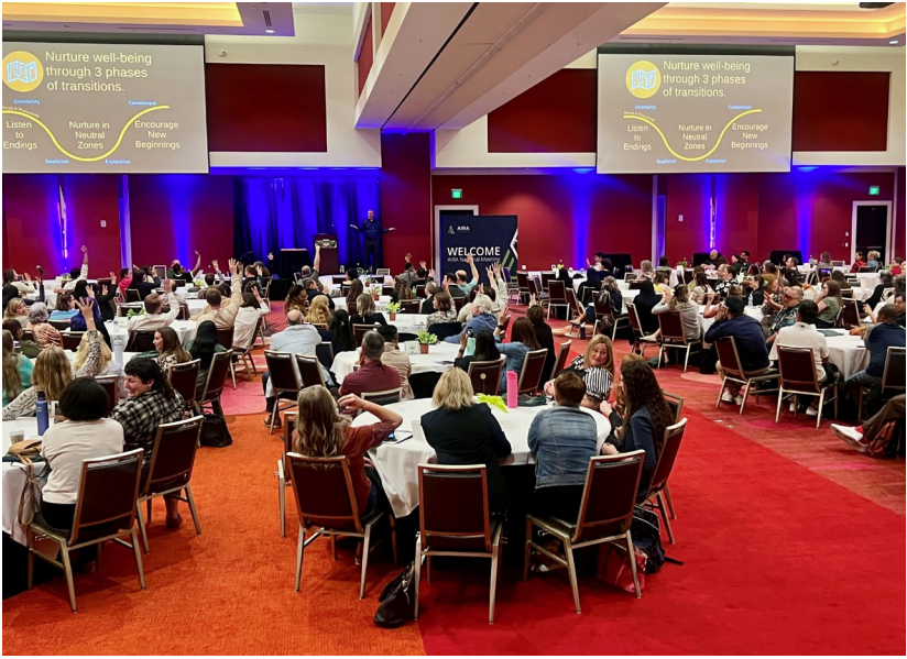 Speaker Scott Crabtree presenting to a large audience